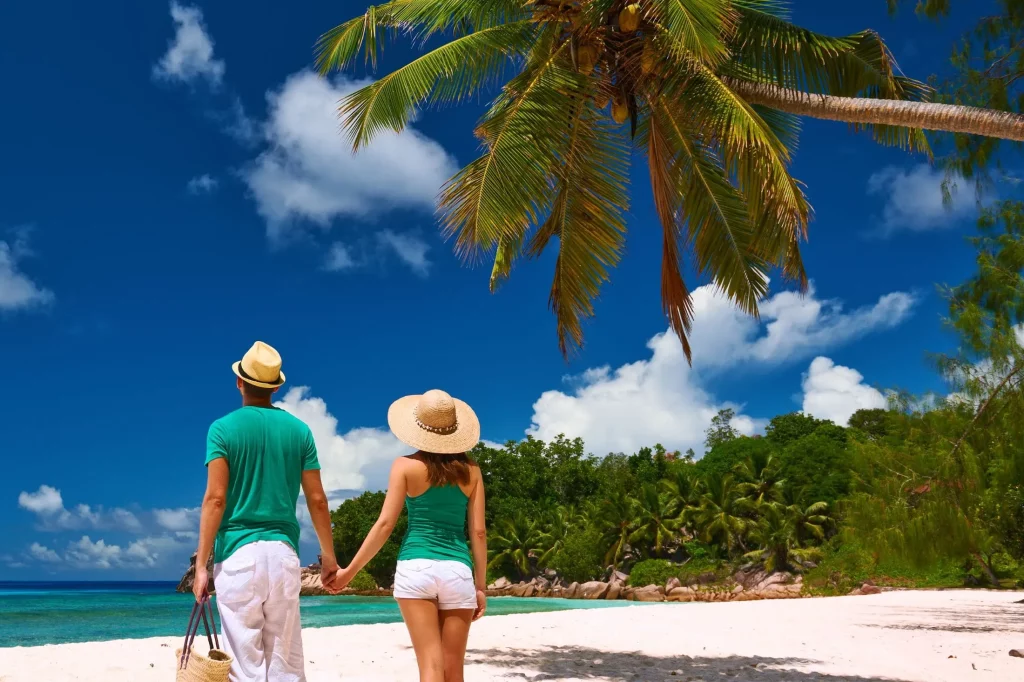 A couple enjoying the romantic Seychelles ambience.