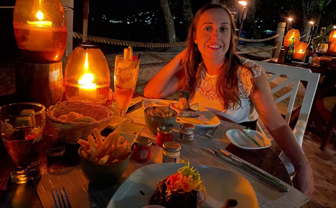 Relaxing outdoor diner at the Eden restaurant in Mahe, Seychelles.