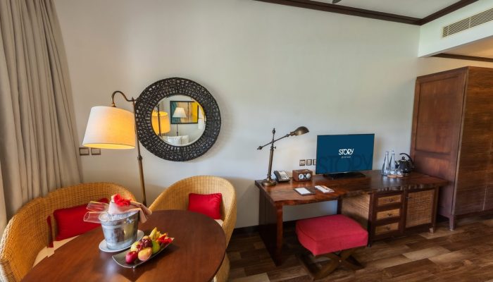 A resort room in Seychelles featuring a work desk with a 