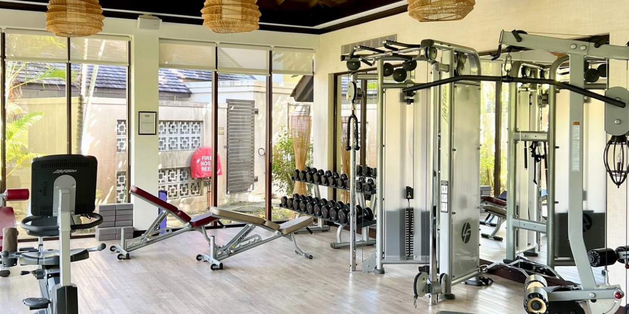 State-of-the-art fitness center with a variety of exercise equipment at a top hotel in Seychelles.