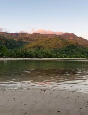 Seychelles Beach with Morne Blanc in the distance.